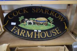 OVAL PLAQUE MARKED 'COCKSPARROW FARMHOUSE'