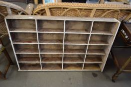 SMALL PIGEONHOLED WALL SHELF