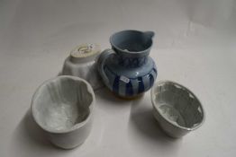 MIXED LOT : THREE JELLY MOULDS AND A BUCHAN POTTERY JUG (4)