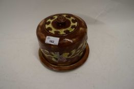 SMALL LATE 19TH CENTURY MAJOLICA TYPE CHEESE BELL, UNSIGNED