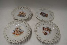 FOUR VARIOUS EARLY 20TH CENTURY RIBBON PLATES, ONE DECORATED WITH ROYALTY SCENE, THE OTHERS WITH