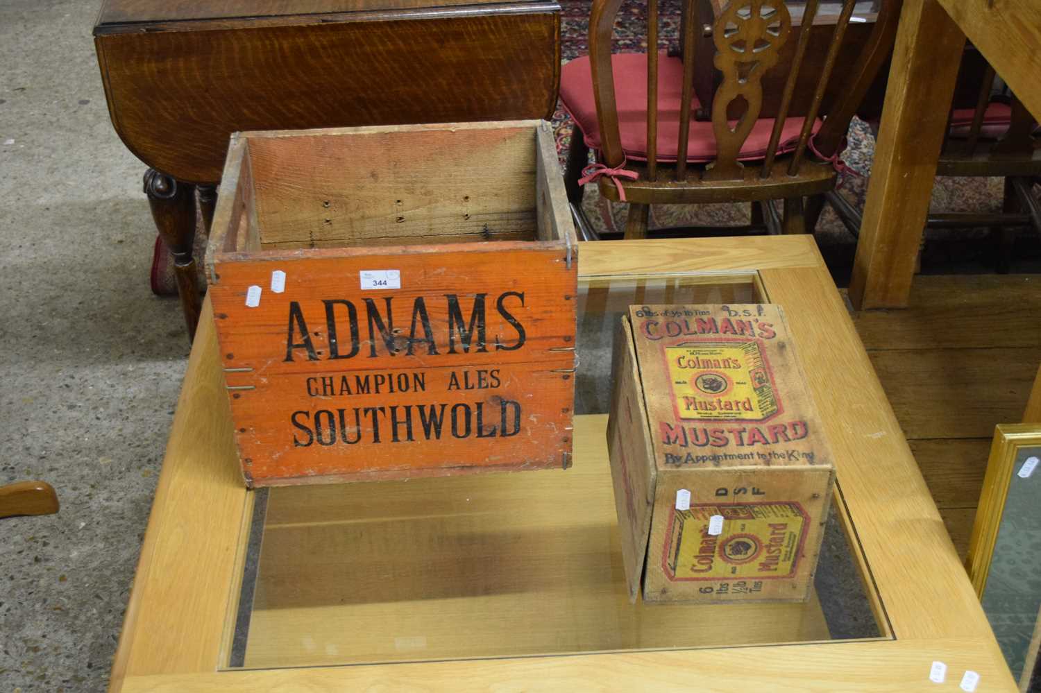 VINTAGE BOTTLE CRATE MARKED 'ADNAMS SOUTHWOLD', TOGETHER WITH A FURTHER CRATE MARKED 'COLMAN'S