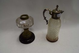 SILVER PLATE MOUNTED CLARET JUG TOGETHER WITH A VICTORIAN OIL LAMP BASE