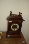 LATE 19TH CENTURY MANTEL CLOCK IN DARK WOOD ARCHITECTURAL CASE WITH APPLIED FLORAL DECORATION