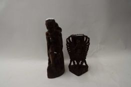 SOUTH EAST ASIAN HARDWOOD FIGURE TOGETHER WITH A CARVED HARDWOOD DEITY (2)