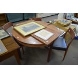 MID-CENTURY TEAK EXTENDING DINING TABLE AND THREE CHAIRS