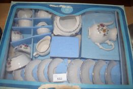 BOX CONTAINING CHILD'S PORCELAIN TEA SET