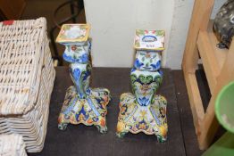 TWO FRENCH FAIENCE CANDLESTICKS