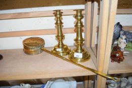 PAIR OF BRASS CANDLESTICKS AND A BRASS CHESTNUT ROASTER (3)