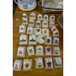 COLLECTION OF MINIATURE CRESTED CHEESE DISHES