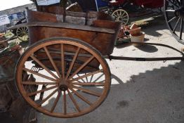 Vintage horse drawn cart with a pair of recently refurbished wheels, width approx 170cm, total