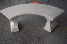 Concrete garden bench, formed in a semi-circle, height approx 40cm, total width approx 130cm