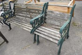 Garden bench with cast iron ends, approx 126cm wide, along with a matching chair, 60cm wide