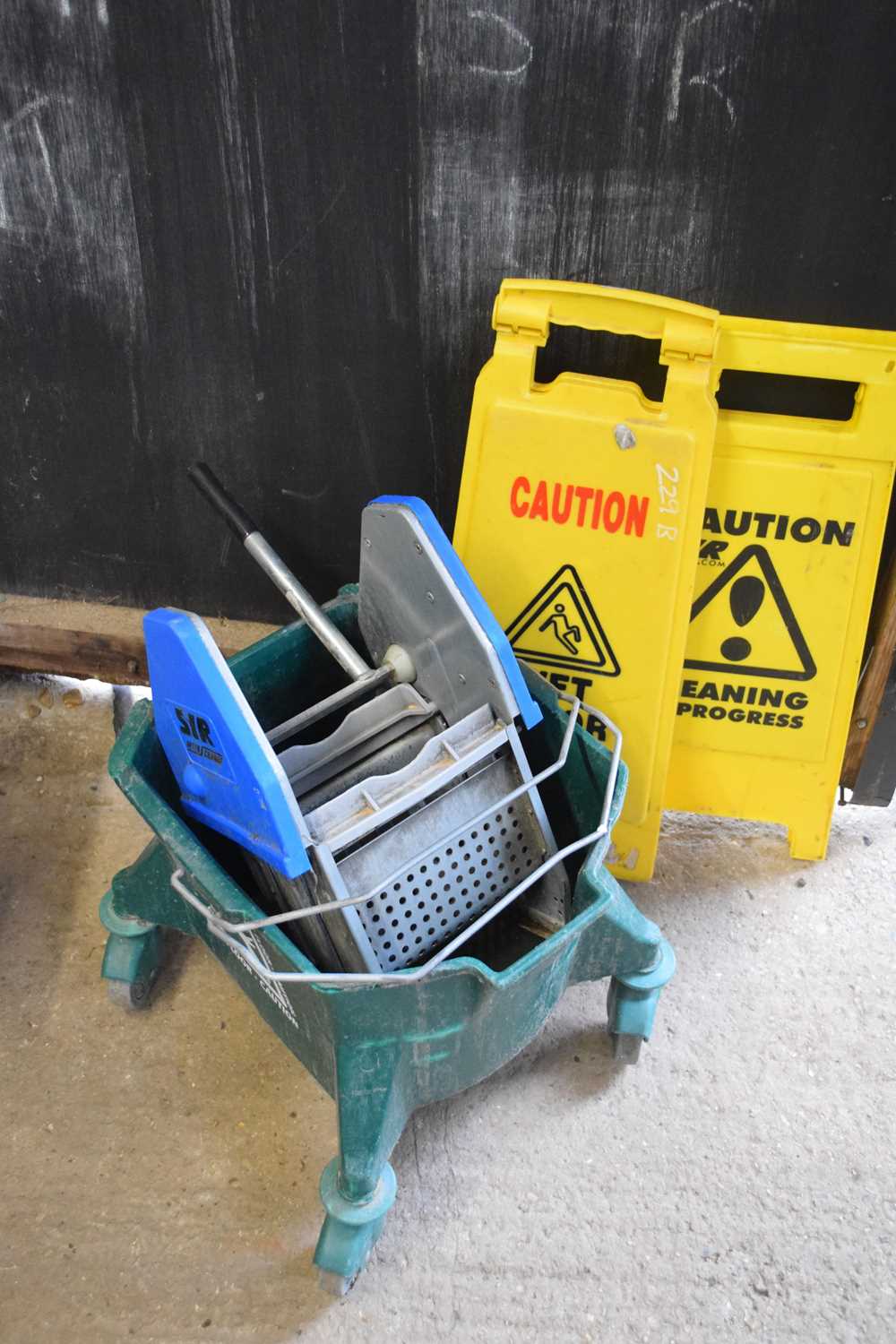 Quantity of hazard signs and cleaning equipment