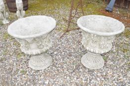 Pair of composite garden urns, approx 55cm high