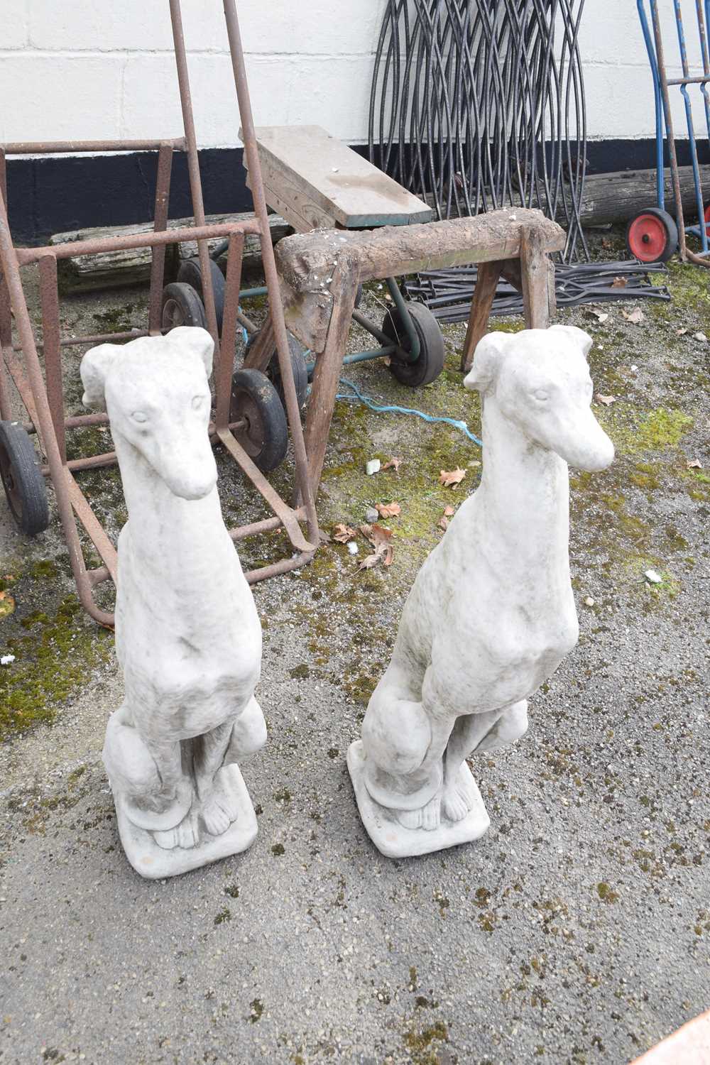 Pair of composite seated whippets, height approx 75cm
