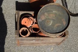 Crate containing a quantity of terracotta plant pots