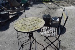 Circular garden table with 2 metal chairs