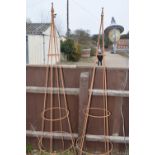 Pair of traditional open framed metal obelisks, 190cm high