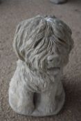 Composite garden ornament formed as a shaggy dog, height approx 40cm