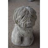 Composite garden ornament formed as a shaggy dog, height approx 40cm