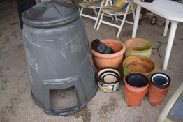 Quantity of plastic garden plant pots, terracotta plant pots and a compost bin