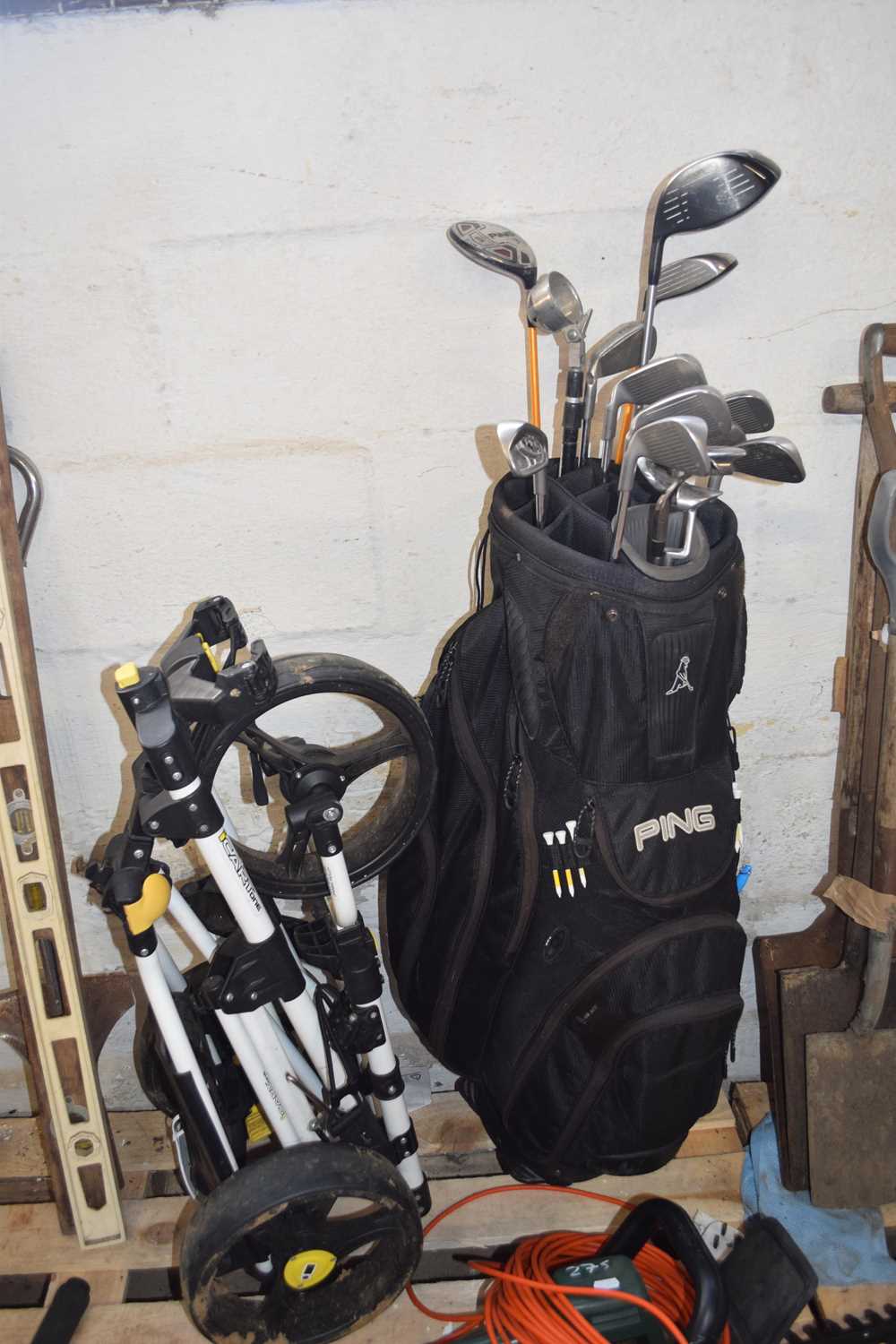 Ping golf bag including Ping clubs along with an I-cart 1 golf trolley