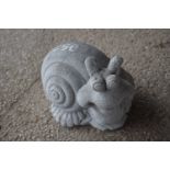 Composite garden ornament formed as a snail, approx 25cm x 30cm