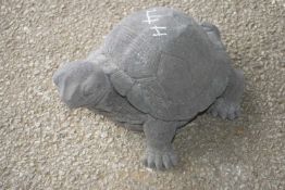 Composite garden ornament in the shape of a tortoise, length approx 35cm, width approx 25cm