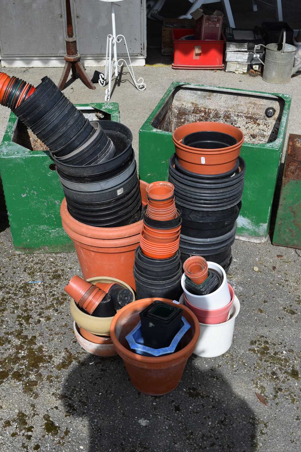 large qty of plastic plant pots