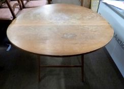 Late 19th/early 20th century hardwood folding coaching table of circular form bearing label to