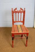 19th century side chair with red painted faux bamboo frame and fabric upholstered seat