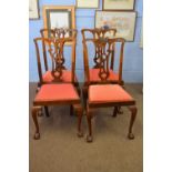 Set of four early 20th century mahogany framed dining chairs with pierced splat backs and ball and