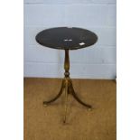19th century ebonised and gilt painted wine table with circular top over a square column with four