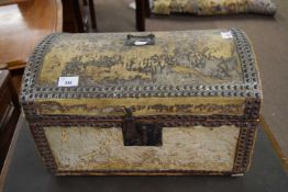 Small 18th/19th century dome top trunk covered in pony skin with metal studded detail, hinged lid