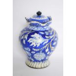 Deco vase and cover, the blue ground with floral decoration, the base marked 'Melba'