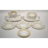 A Shelley Art Deco part tea set decorated with a feather pattern no. 12457 comprising 10 trios, milk