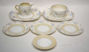 A Shelley Art Deco part tea set decorated with a feather pattern no. 12457 comprising 10 trios, milk