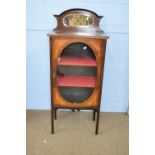 Edwardian mahogany and inlaid music cabinet with mirrored back and single door with oval glazed