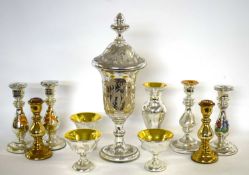 Quantity of mercury glass wares including a large chalice shaped vase and cover, two pairs of