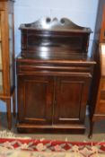 Small 19th century mahogany chiffonier with broken arch pediment over a single shelf, the body