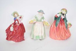 Group of three Royal Doulton figures comprising 'Daffy Down Dilly', 'Lady Charmian' and 'Autumn