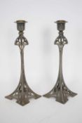 Pair of WMF Art Nouveau candlesticks with factory stamp to base, 28cm high (2)