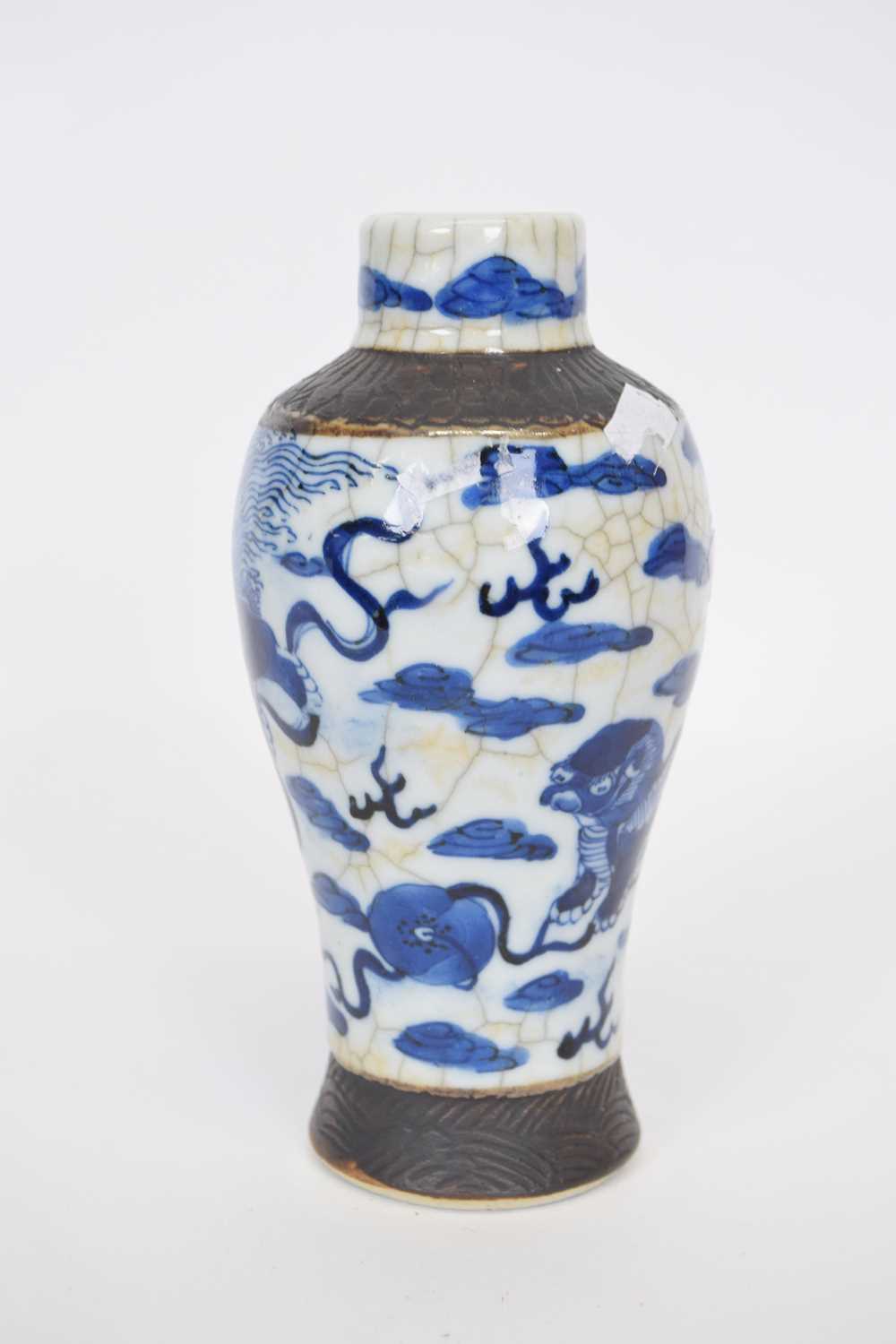 Chinese porcelain crackle ware vase of baluster shape with underglaze blue design of dragon