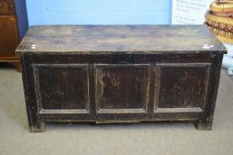 18th century oak coffer with board top over three panelled front raised on short stile feet, 134cm