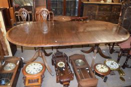 Reproduction Georgian style mahogany twin pedestal dining table raised on turned column with