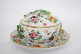 Small Meissen tureen and cover and stand decorated in relief with flowers (restoration to stand