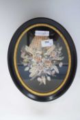 Shell model of a basket of flowers in black wooden frame, label verso for Mai Williams
