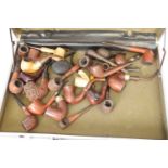 Suitcase containing a quantity of smoking pipes including a peterson's system, ORLIK hurricane,