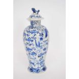 Chinese porcelain vase and cover with blue decoration of birds and branches, 22cm high